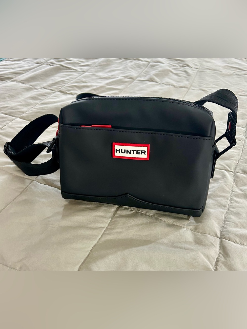 Hunter Black Crossbody Bag with Red Accents, Logo on Front